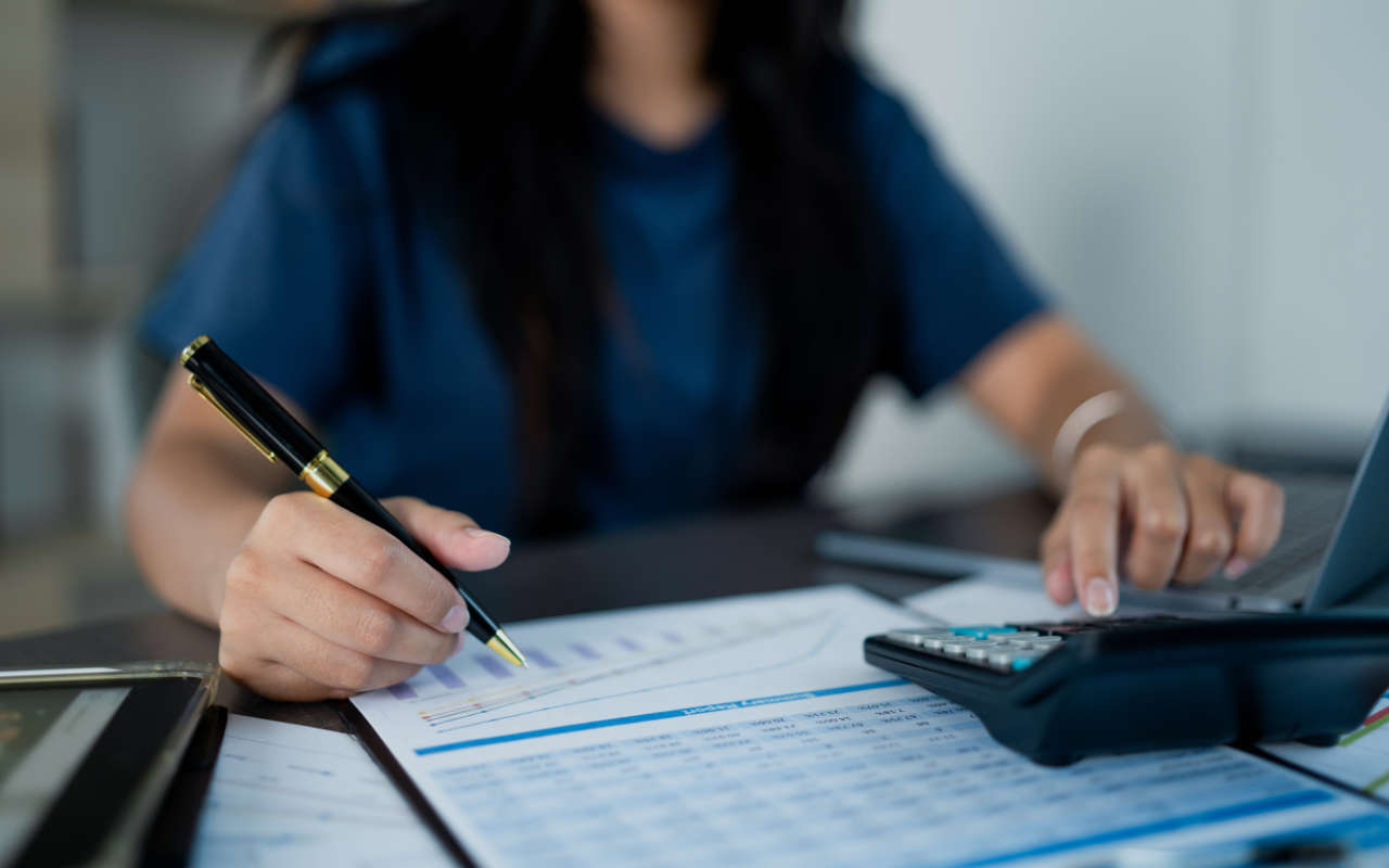 Accountant at work on spreadsheets