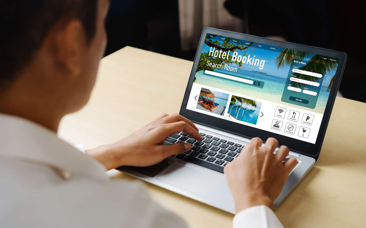 Online hotel booking using a laptop
